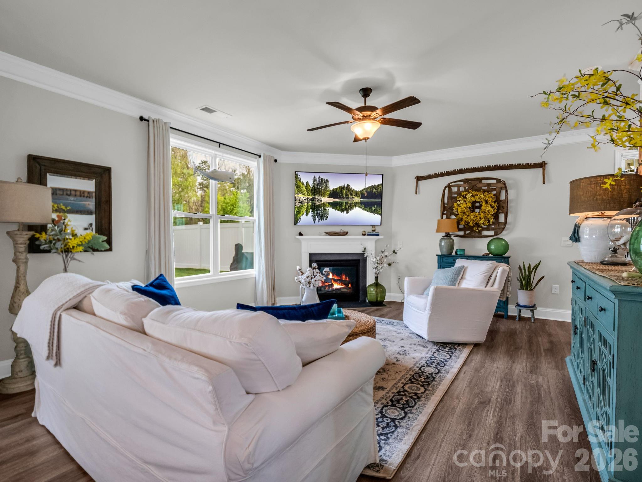 383 Fox Cove Road Hendersonville, NC 28792 - Photo 12 of 34 a bedroom with a bed couch and a window