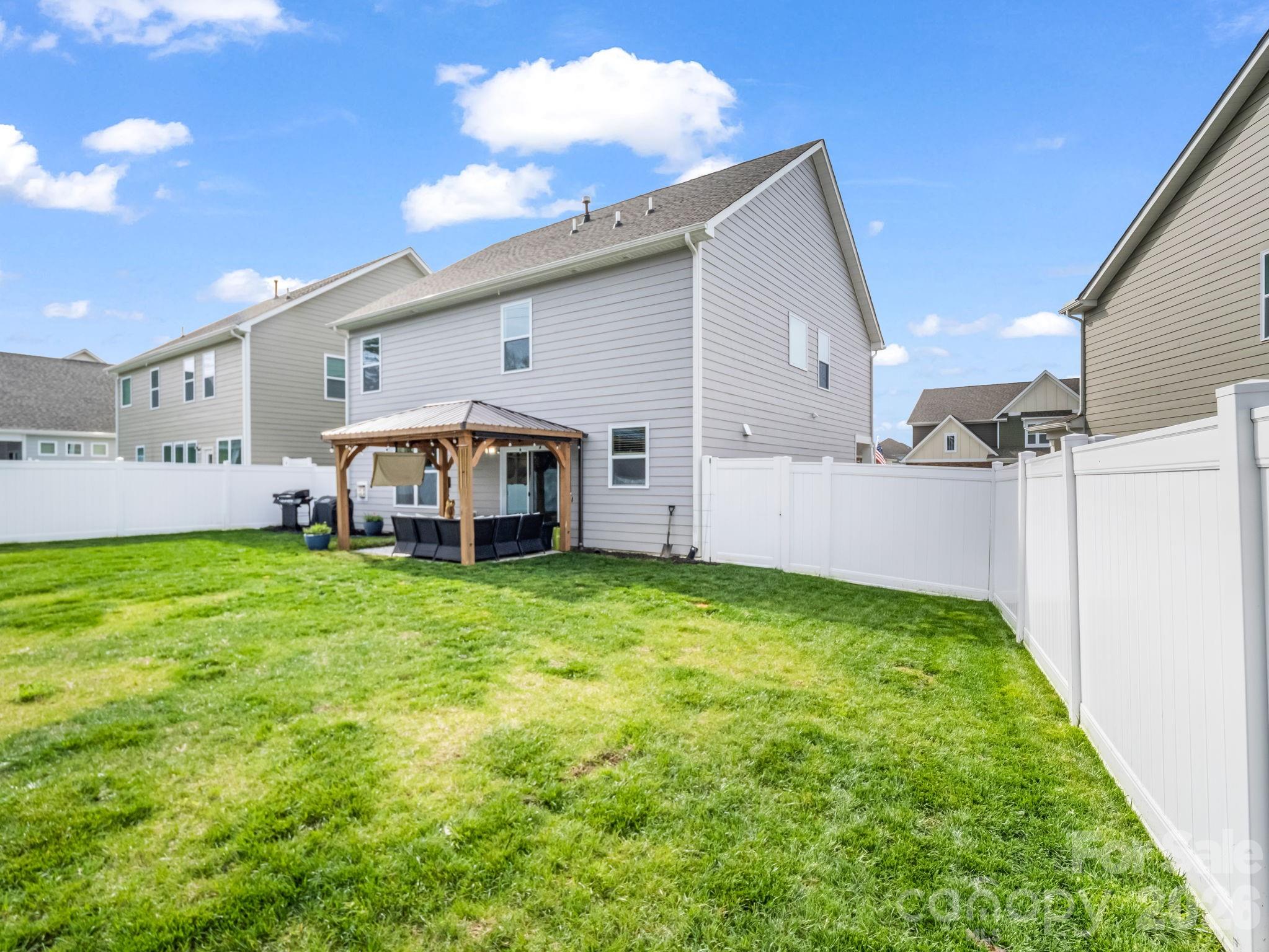 383 Fox Cove Road Hendersonville, NC 28792 - Photo 33 of 34 a view of a backyard with plants and a patio