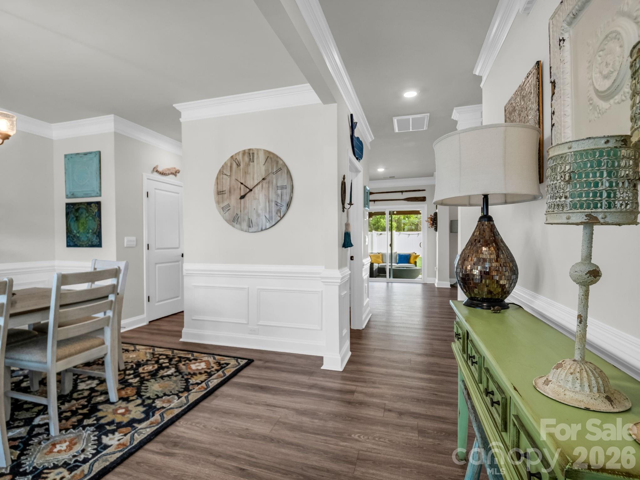 383 Fox Cove Road Hendersonville, NC 28792 - Photo 5 of 34 a living room with furniture and a clock