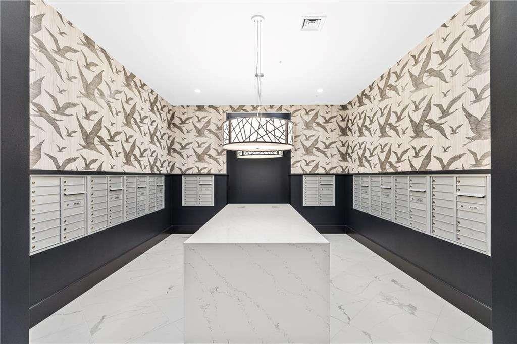 775 Juniper Street Northeast, Unit 212 Atlanta, GA 30308 - Photo 15 of 41 a view of kitchen with a sink and cabinets