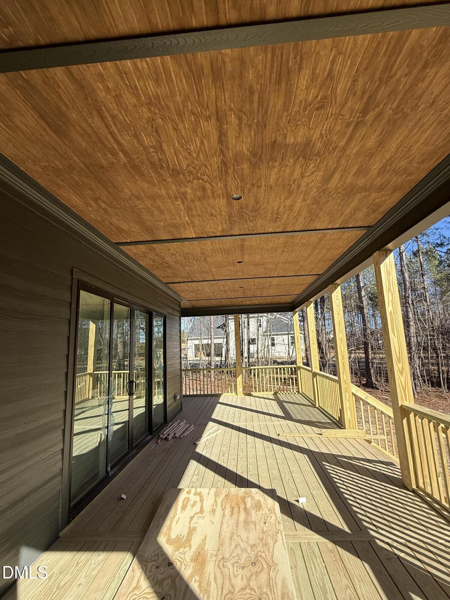 12625 Burgess Road Middlesex, NC 27557 - Photo 8 of 9 a view of a balcony with wooden floor