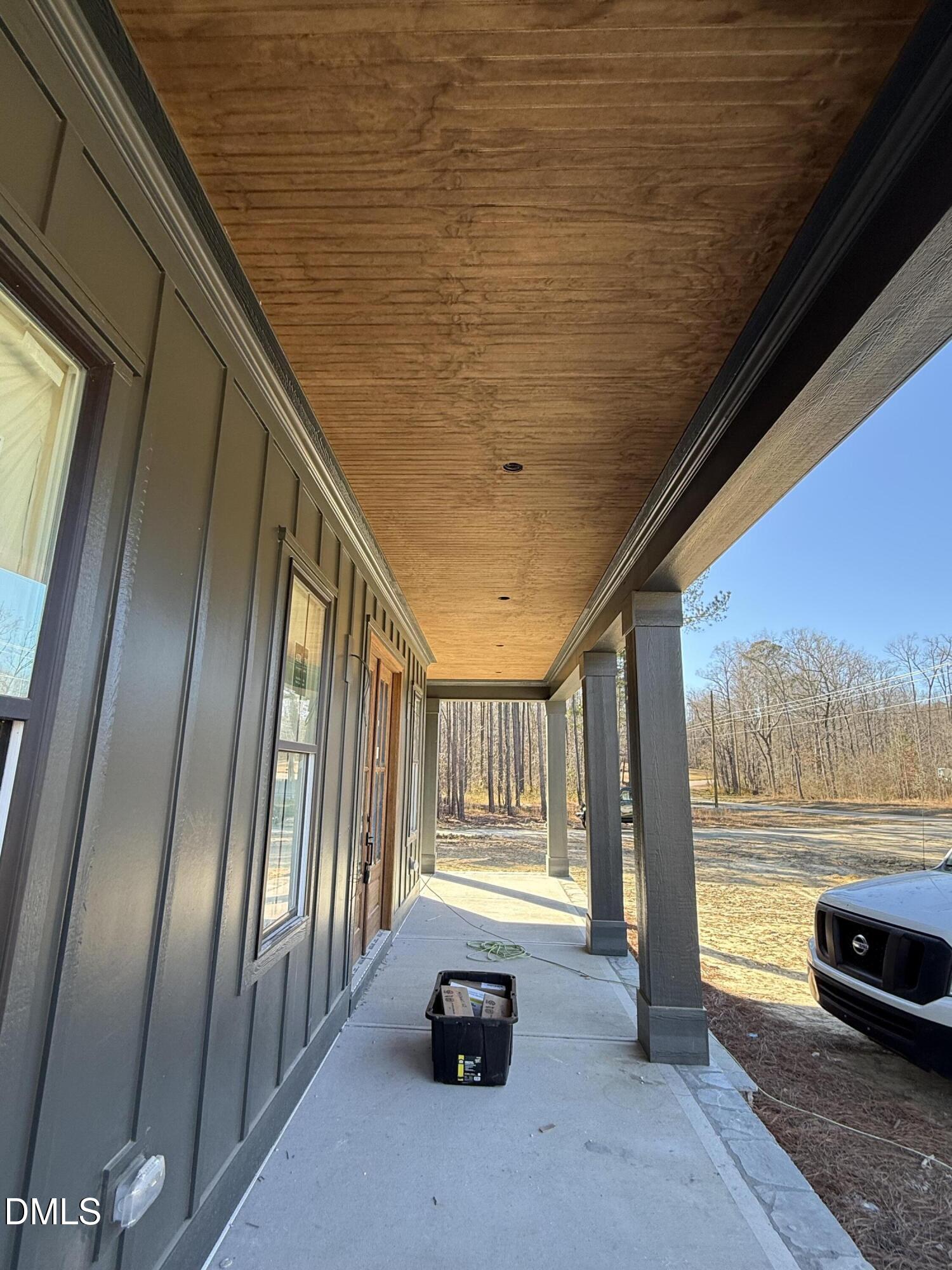 12625 Burgess Road Middlesex, NC 27557 - Photo 9 of 9 a view of sitting area in balcony with floor to ceiling window