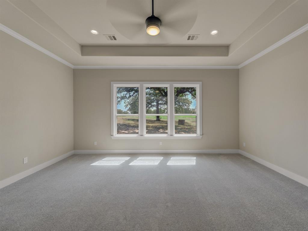 1000 Henry Way Springtown, TX 76082 - Photo 18 of 38 an empty room with windows