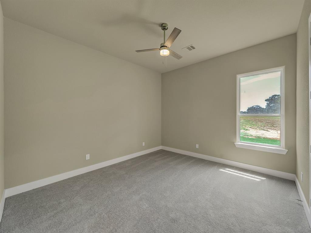 1000 Henry Way Springtown, TX 76082 - Photo 30 of 38 an empty room with a window