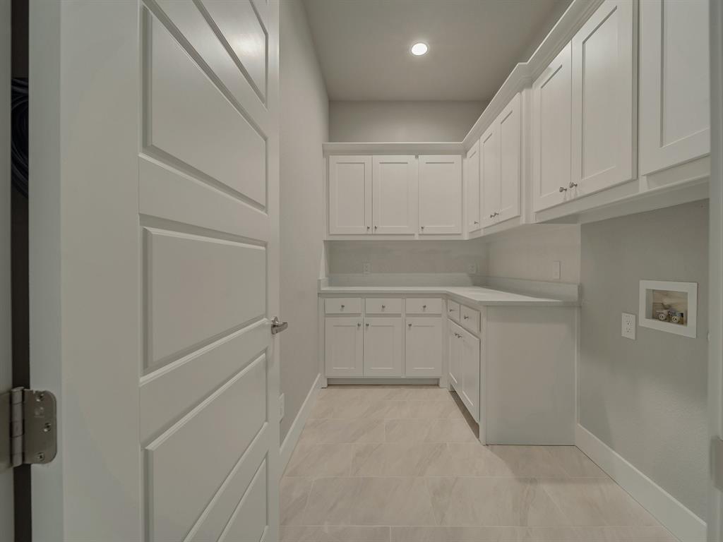 1000 Henry Way Springtown, TX 76082 - Photo 36 of 38 a view of walk in closet with white cabinet