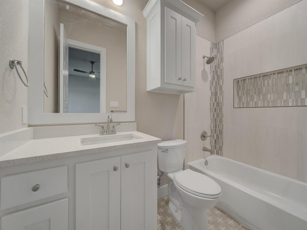 1000 Henry Way Springtown, TX 76082 - Photo 10 of 38 a bathroom with a sink a toilet and shower