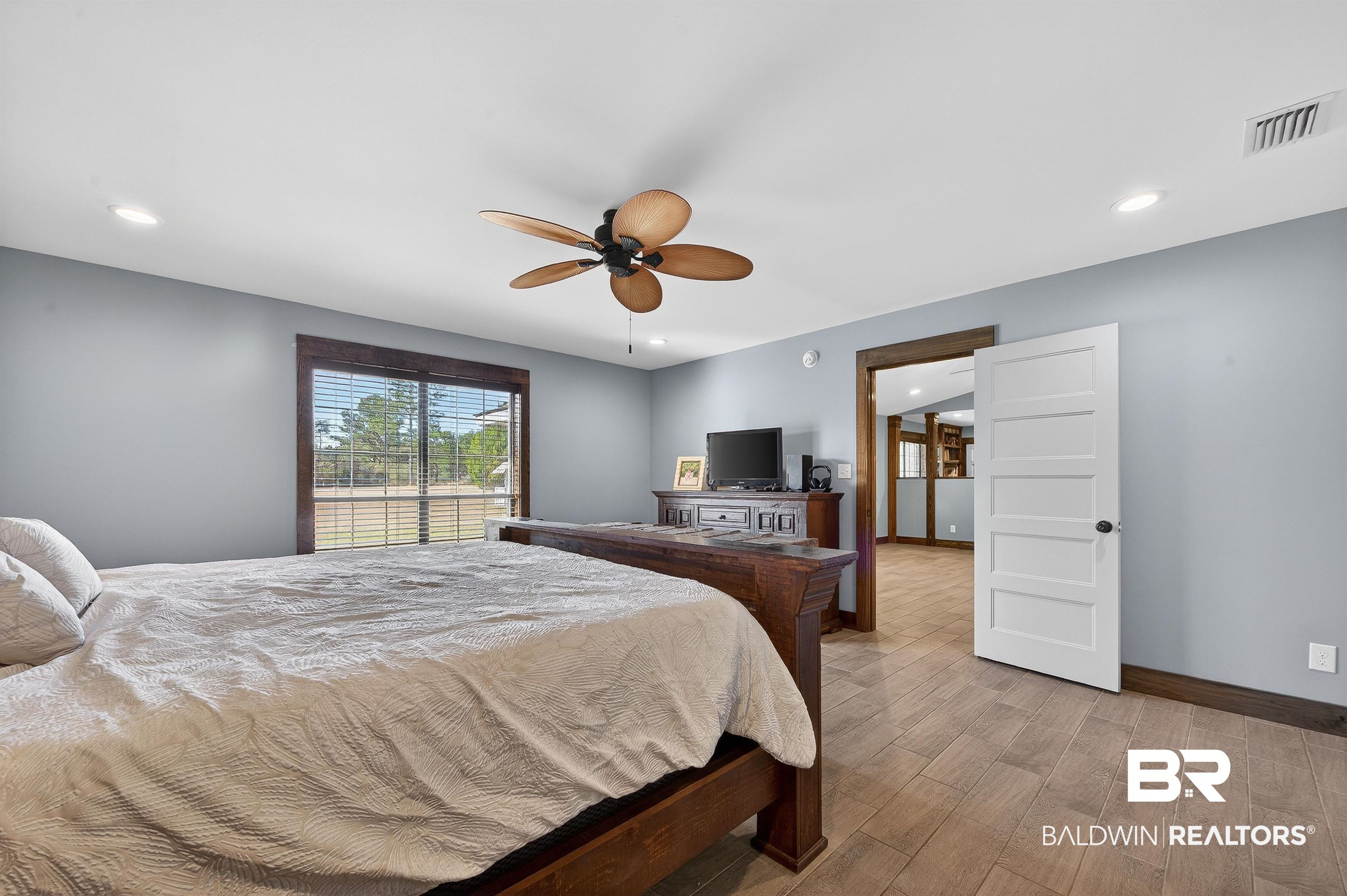 29635 Gardner Road Elberta, AL 36530 - Photo 25 of 66 Bedroom with recessed lighting, wood finish floors, and ceiling fan