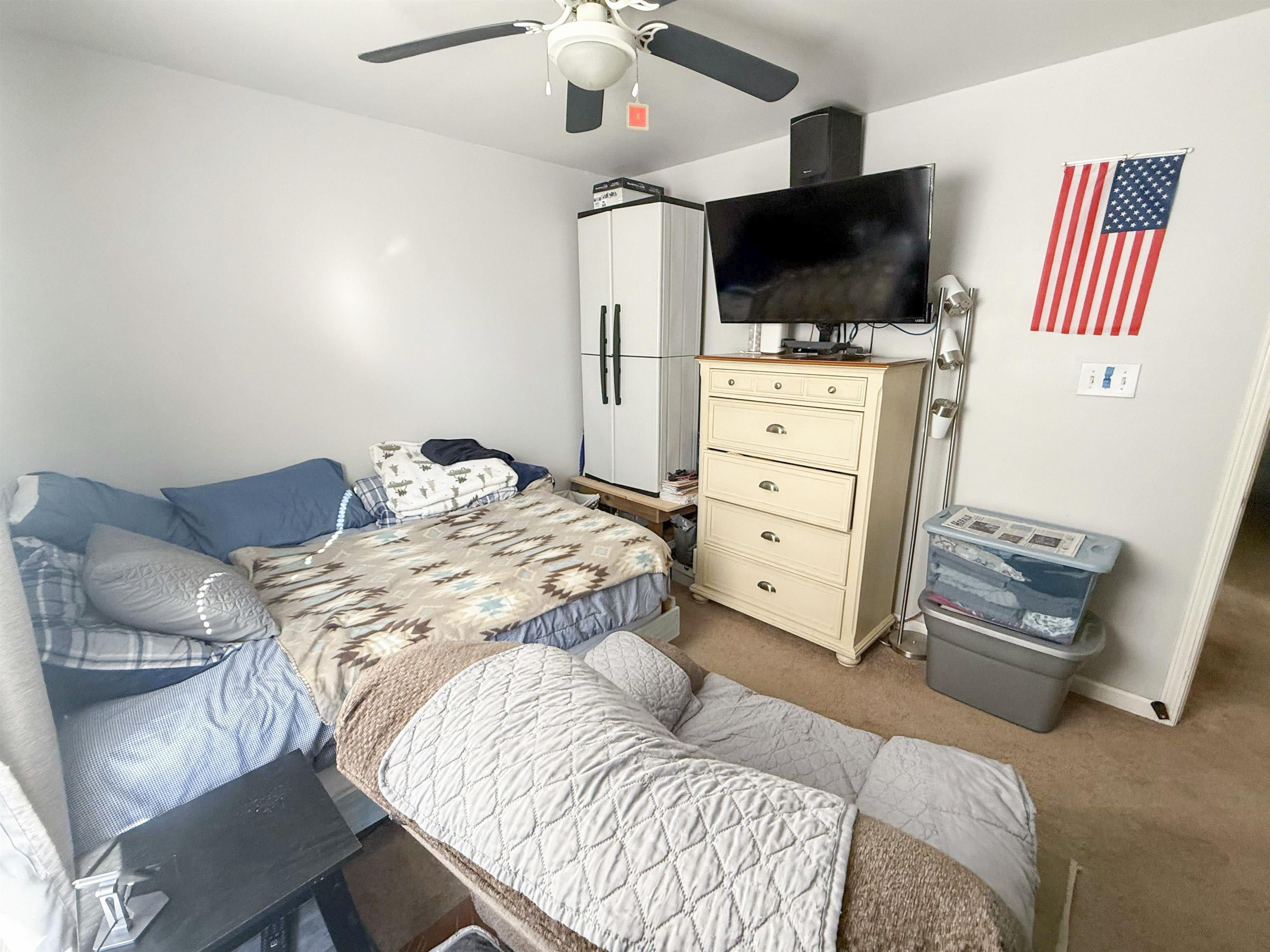 4 Rutledge Avenue Del Haven, NJ 08251 - Photo 11 of 21 a bedroom with a bed and flat screen tv