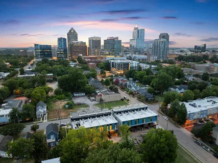 an aerial view of a city with lots of buildings