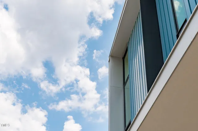 a room that has a bed and a chair