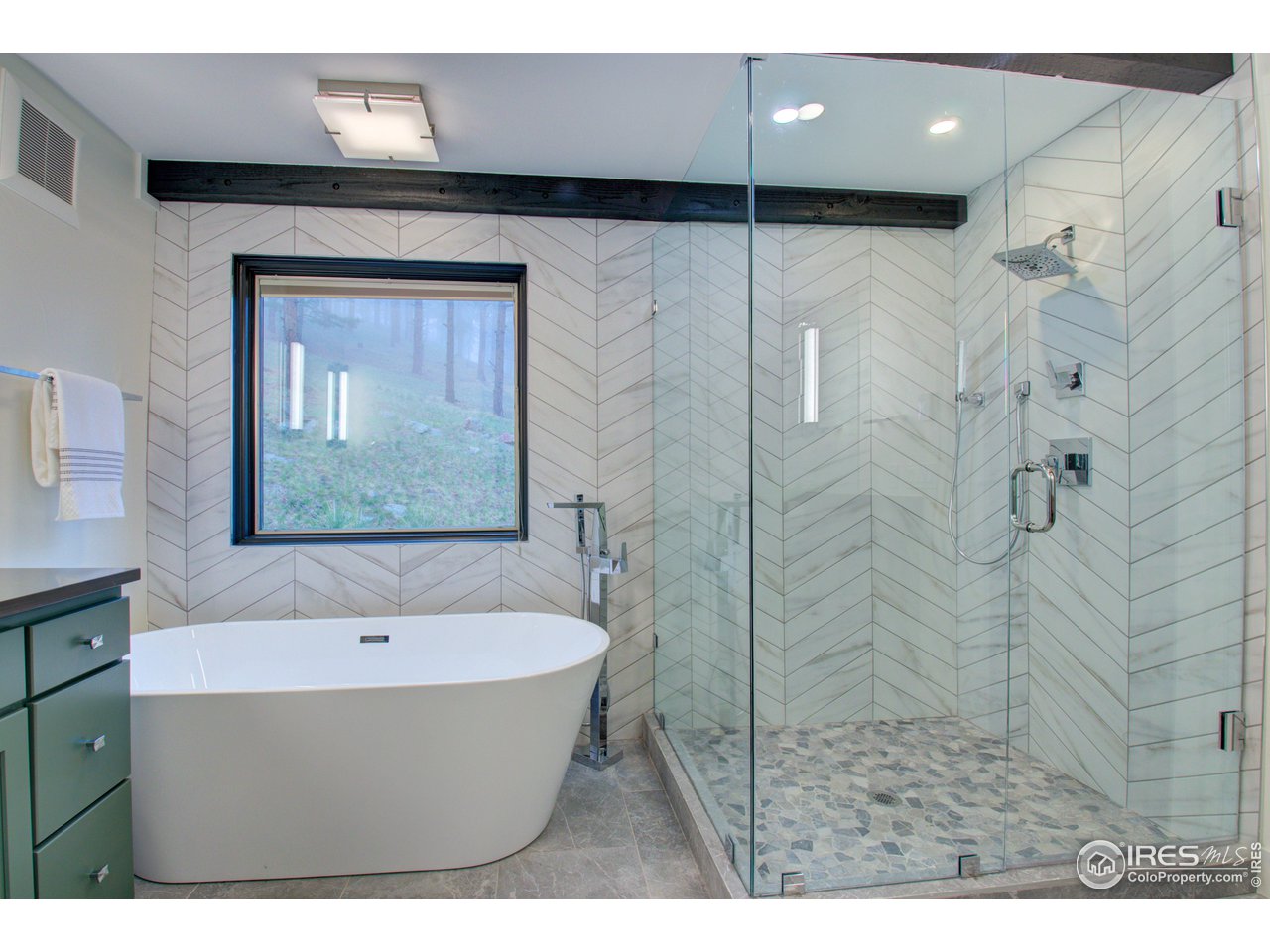 159 Alpine Way Boulder, CO 80304 - Photo 24 of 40 Soaking tub with a view and frameless glass shower