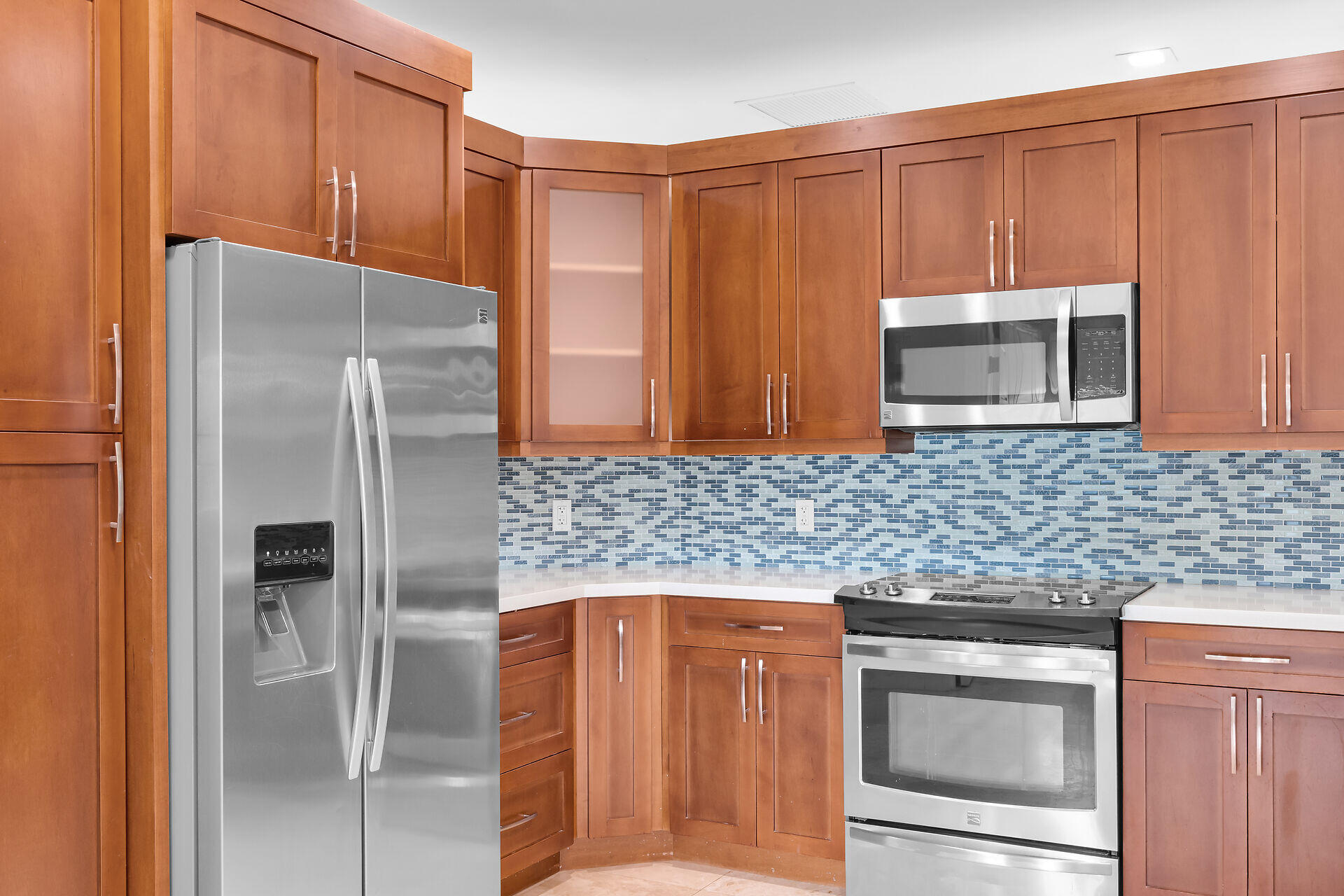 19900 Southwest 280th Street Homestead, FL 33031 - Photo 24 of 52 a kitchen with granite countertop stainless steel appliances and refrigerator