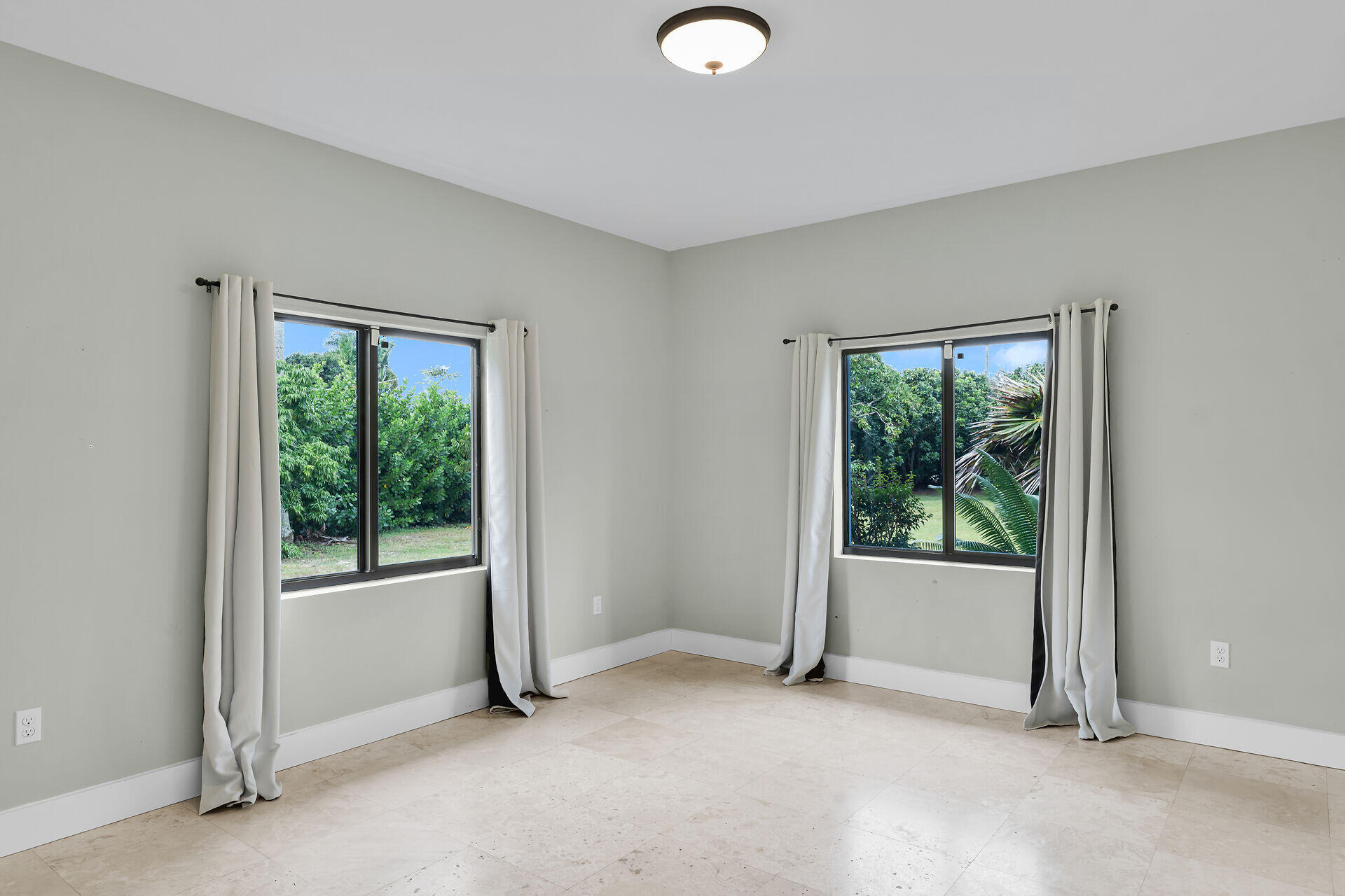 19900 Southwest 280th Street Homestead, FL 33031 - Photo 32 of 52 an empty room with windows