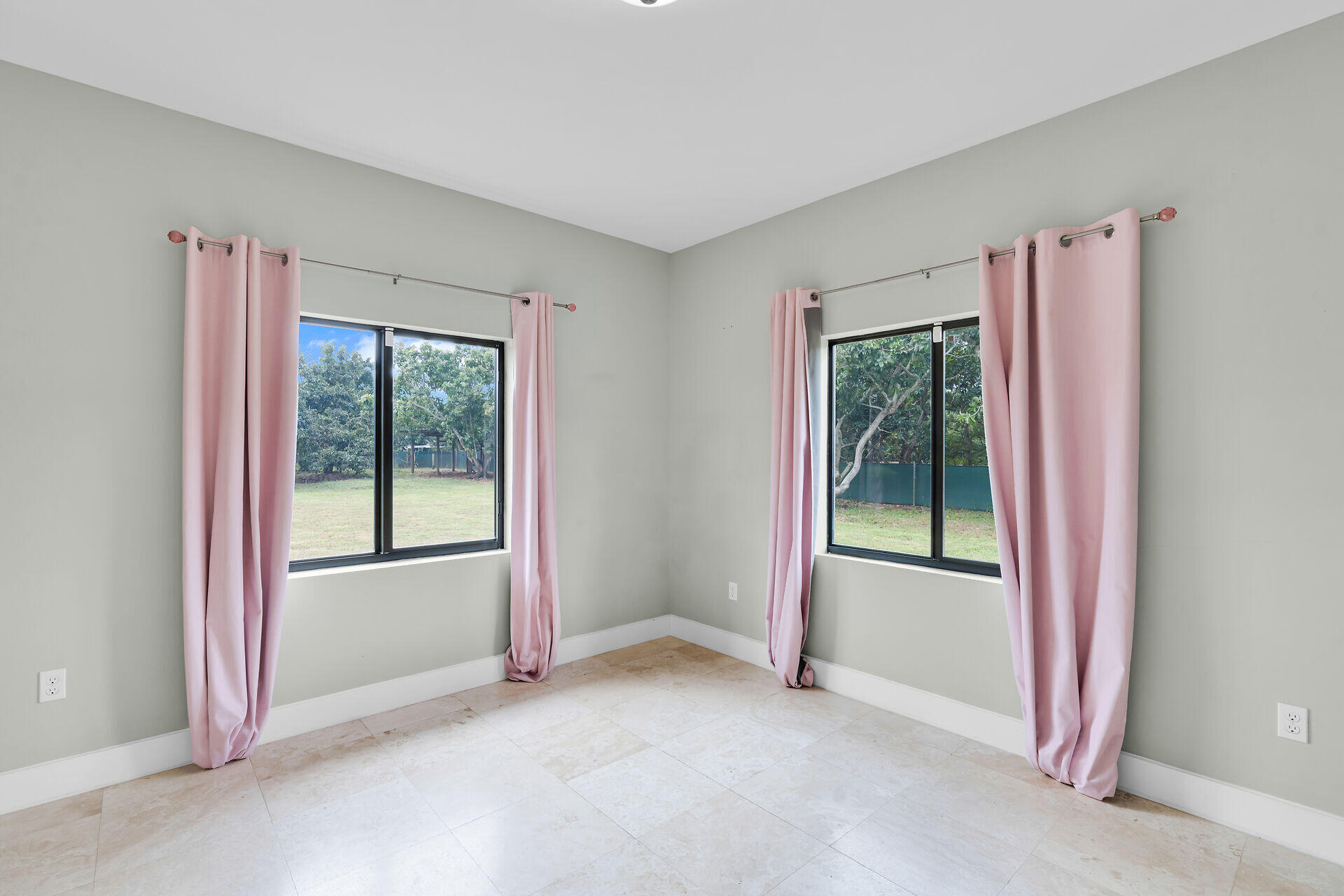 19900 Southwest 280th Street Homestead, FL 33031 - Photo 36 of 52 a view of an empty room with glass door and balcony