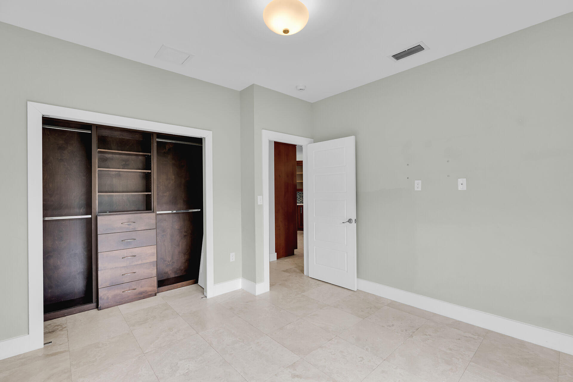 19900 Southwest 280th Street Homestead, FL 33031 - Photo 37 of 52 a view of an empty room with a kitchen