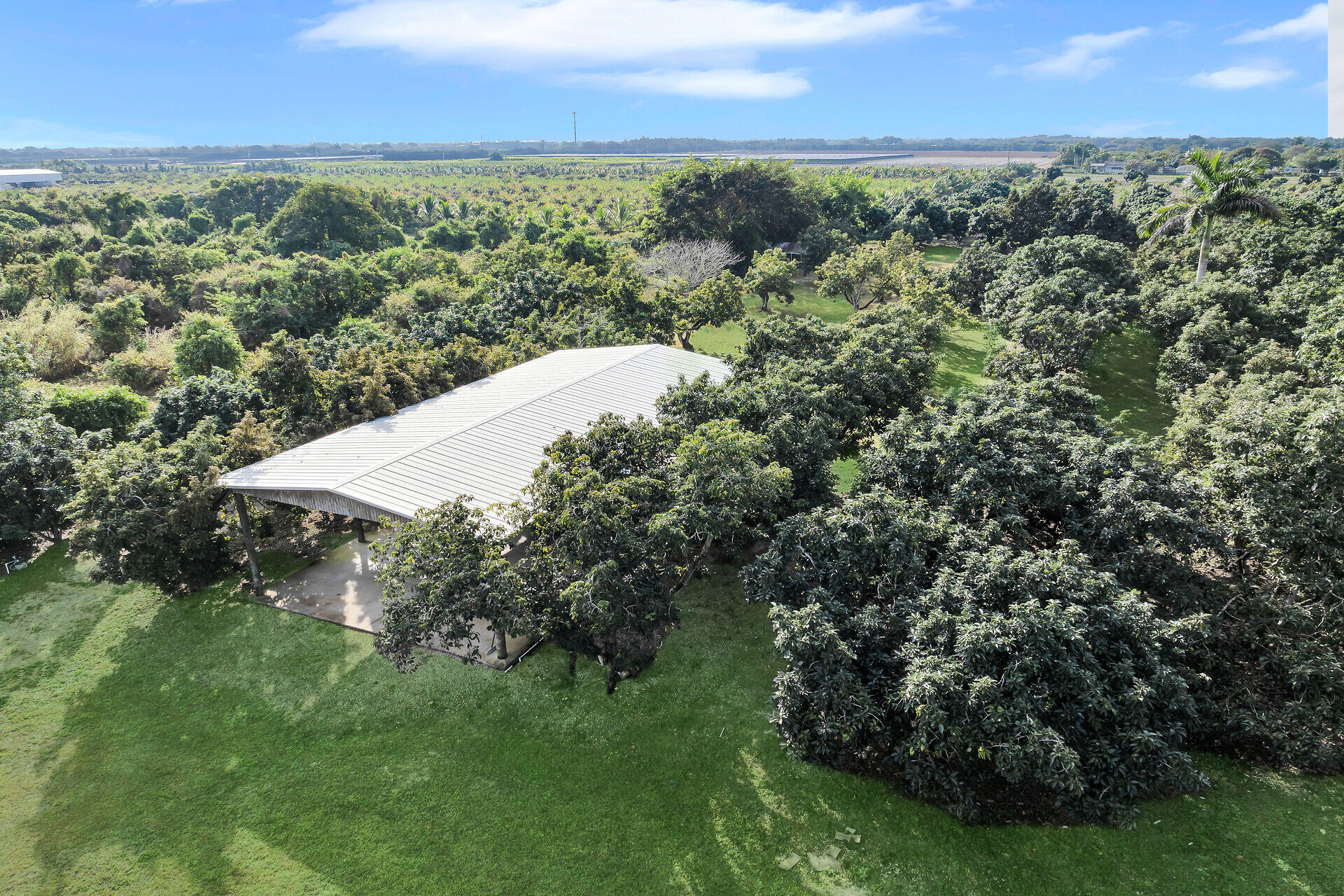 19900 Southwest 280th Street Homestead, FL 33031 - Photo 5 of 52 an aerial view of a house with a yard