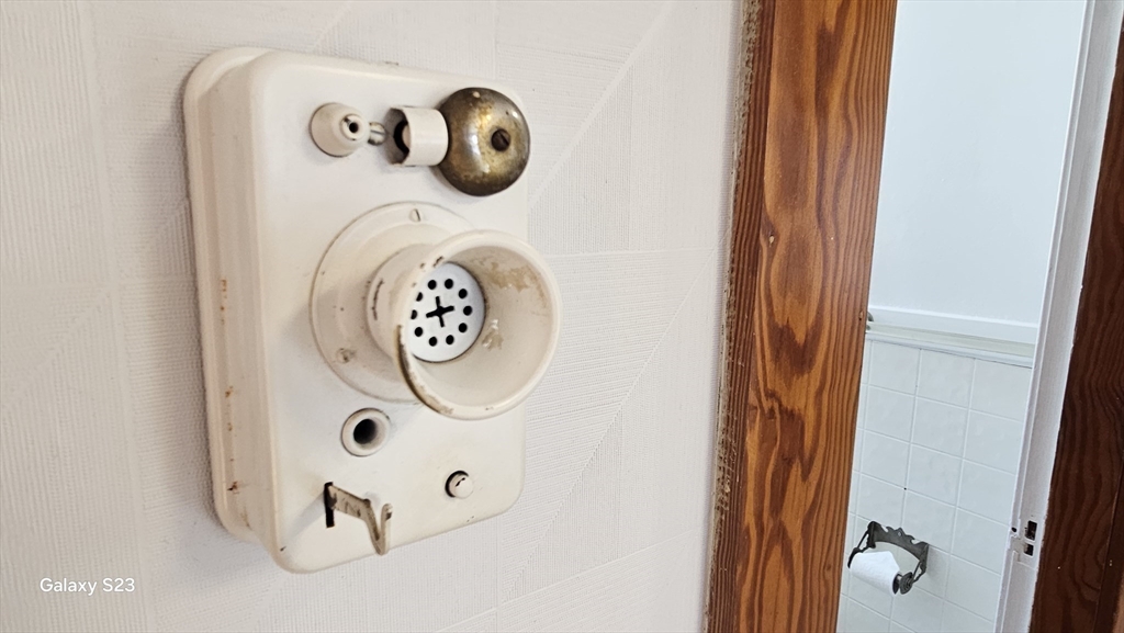 17 Cleveland Avenue, Unit 3 Worcester, MA 01603 - Photo 20 of 25 a bathroom with a mirror and a shower