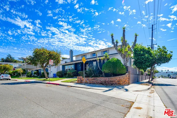 a front view of a house with a garage