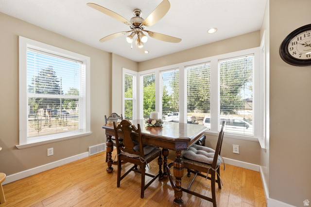 310 East 600 South Centerville, UT 84014 - Photo 11 of 41 Dining area featuring light wood-finish flooring, neutral wall tones, and white trim