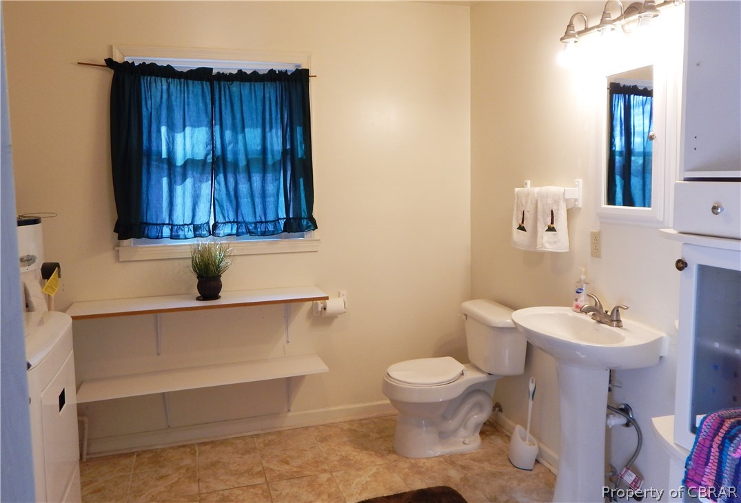 8968 River Road Lancaster, VA 22503 - Photo 13 of 16 Half Bath & Laundry Room