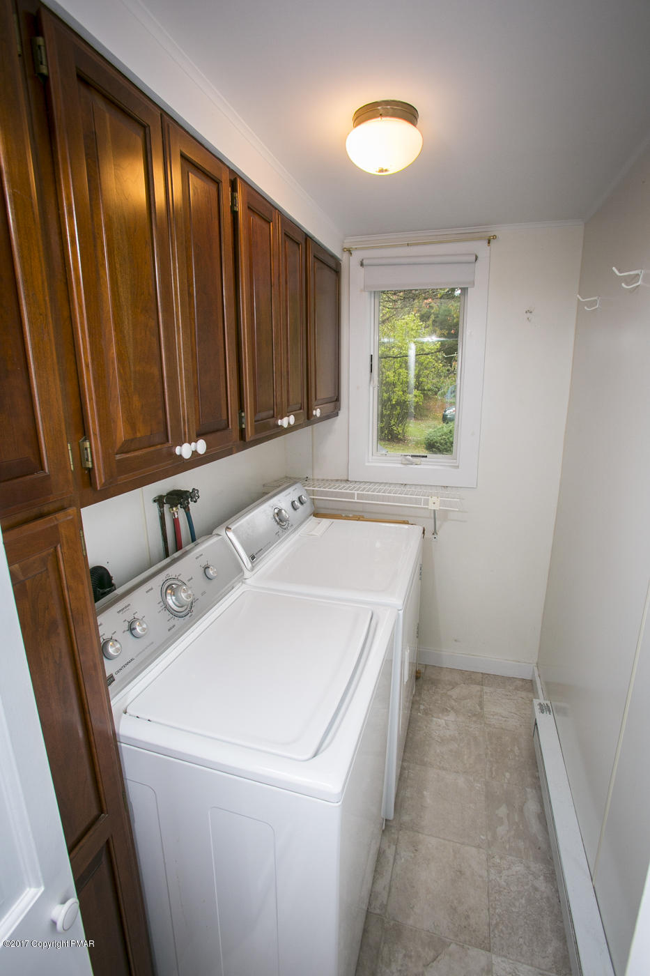 429 Upper Swiftwater Road Cresco, PA 18326 - Photo 11 of 50 a utility room with dryer and washer