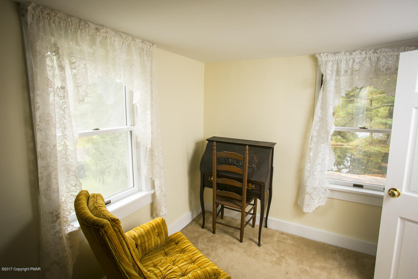 429 Upper Swiftwater Road Cresco, PA 18326 - Photo 25 of 50 a living room with furniture and a window