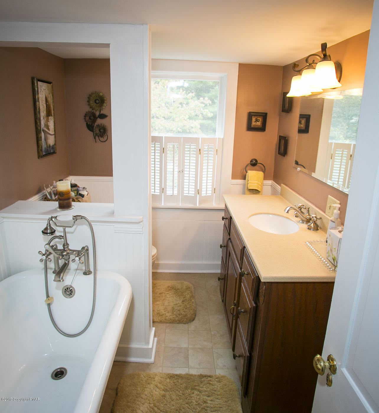 429 Upper Swiftwater Road Cresco, PA 18326 - Photo 28 of 50 a bathroom with a tub sink and mirror