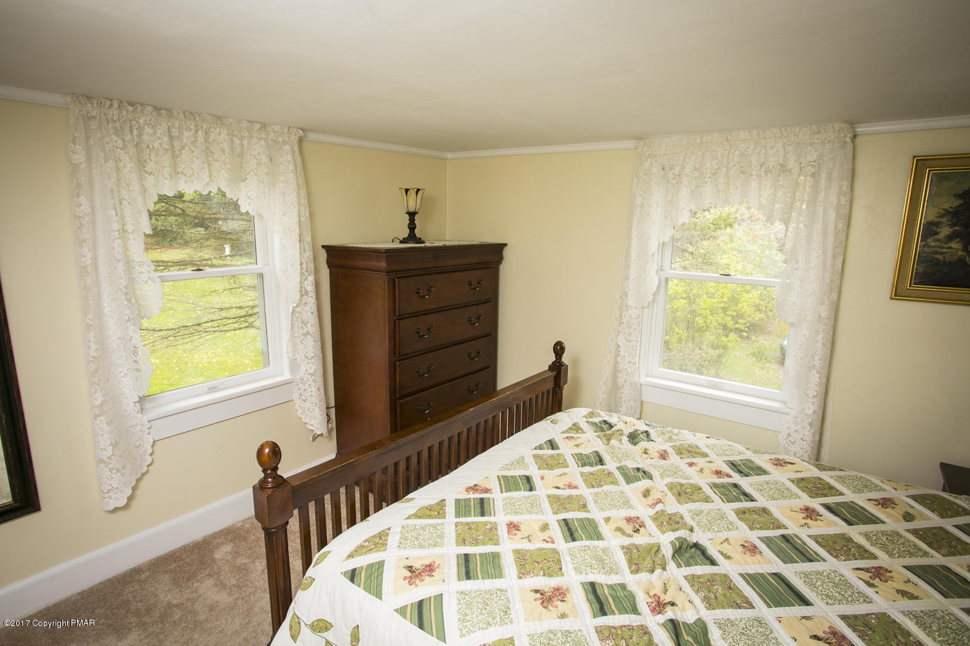 429 Upper Swiftwater Road Cresco, PA 18326 - Photo 30 of 50 a bedroom with a bed and a window