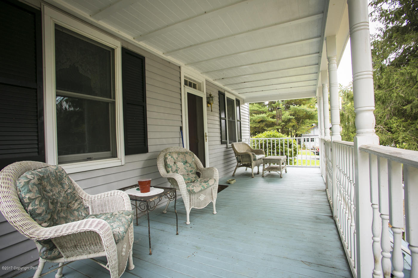 429 Upper Swiftwater Road Cresco, PA 18326 - Photo 38 of 50 a backyard of a house with table and chairs
