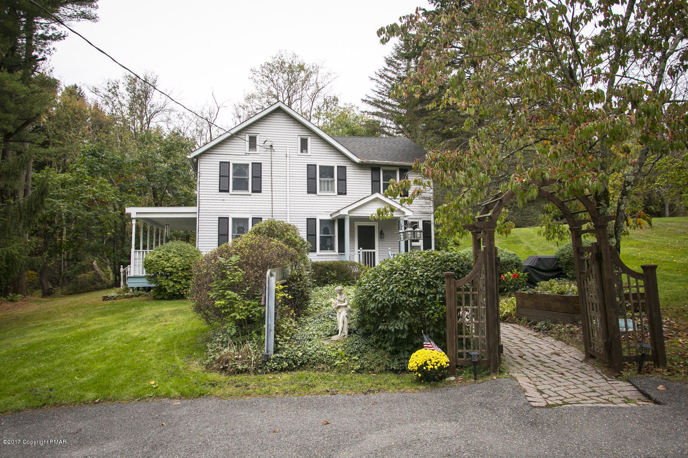 429 Upper Swiftwater Road Cresco, PA 18326 - Photo 4 of 50 a front view of house with trees in the background