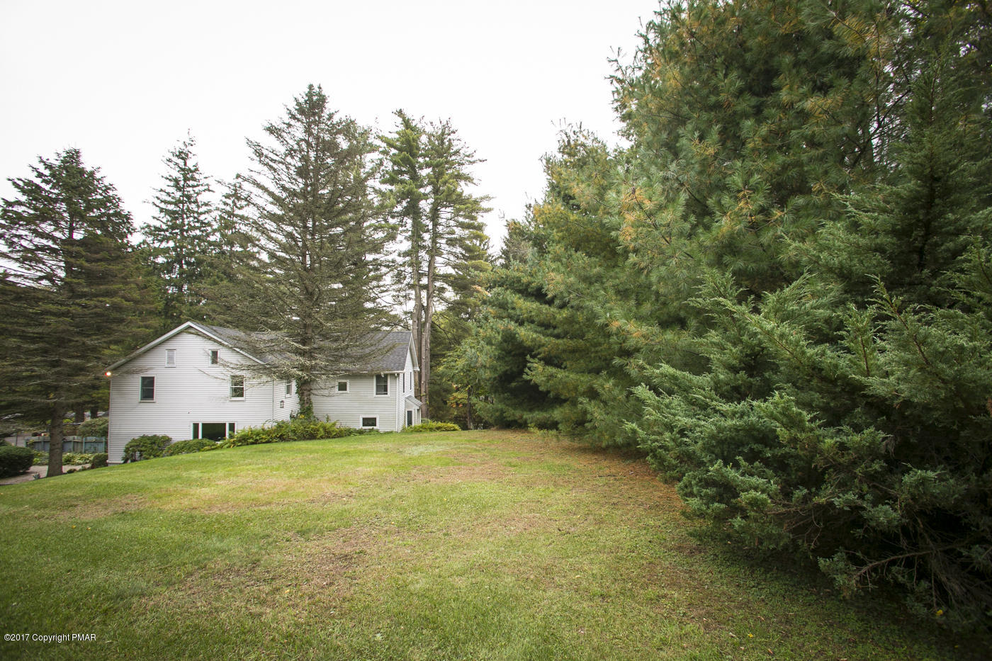 429 Upper Swiftwater Road Cresco, PA 18326 - Photo 43 of 50 a view of a house with backyard and garden