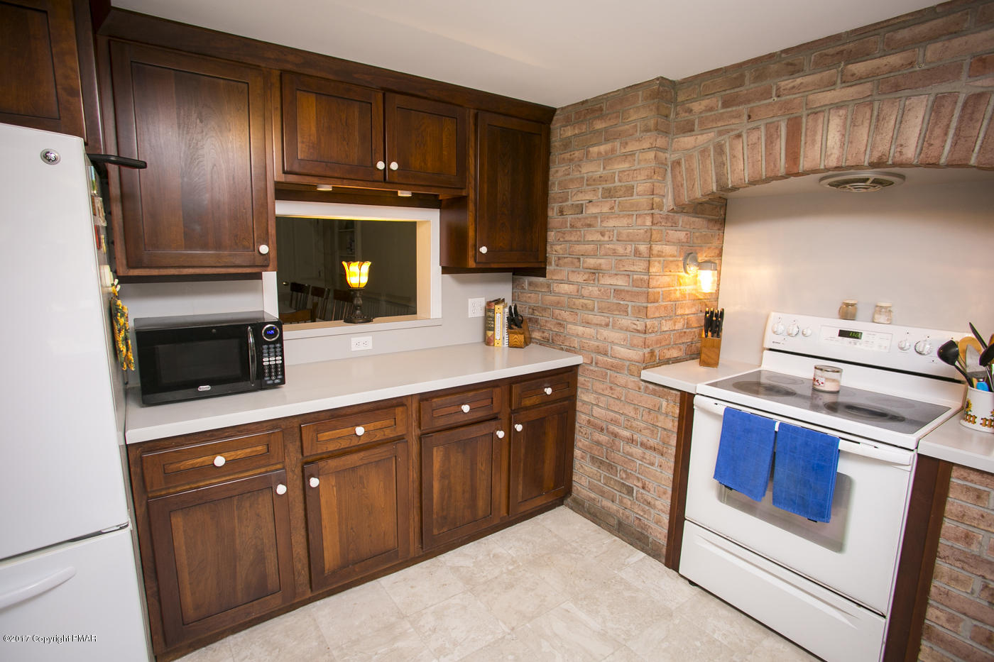 429 Upper Swiftwater Road Cresco, PA 18326 - Photo 9 of 50 a kitchen with stainless steel appliances granite countertop a sink stove and refrigerator