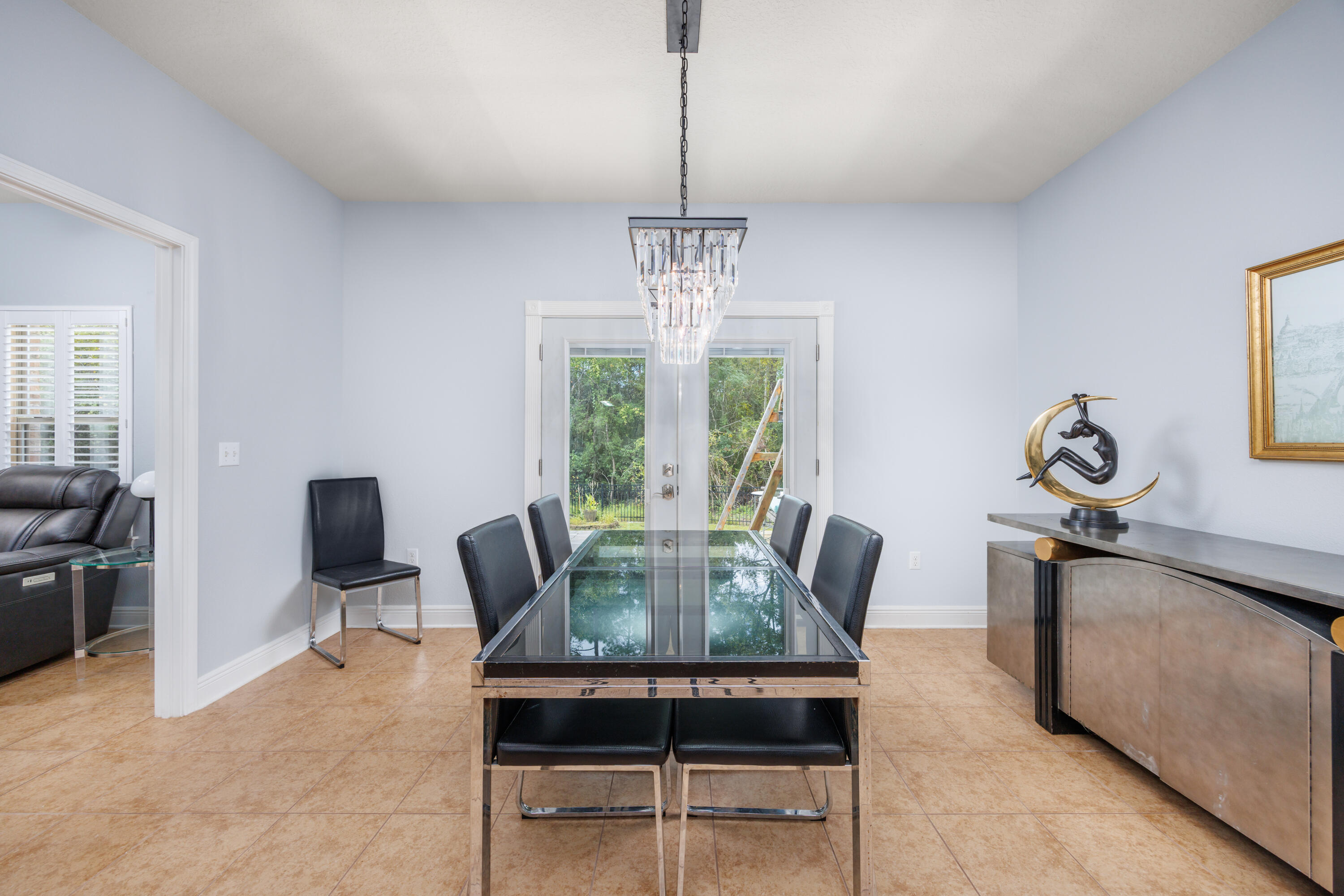 38 Camellia Court Freeport, FL 32439 - Photo 14 of 91 a view of a dining room with furniture window and outside view