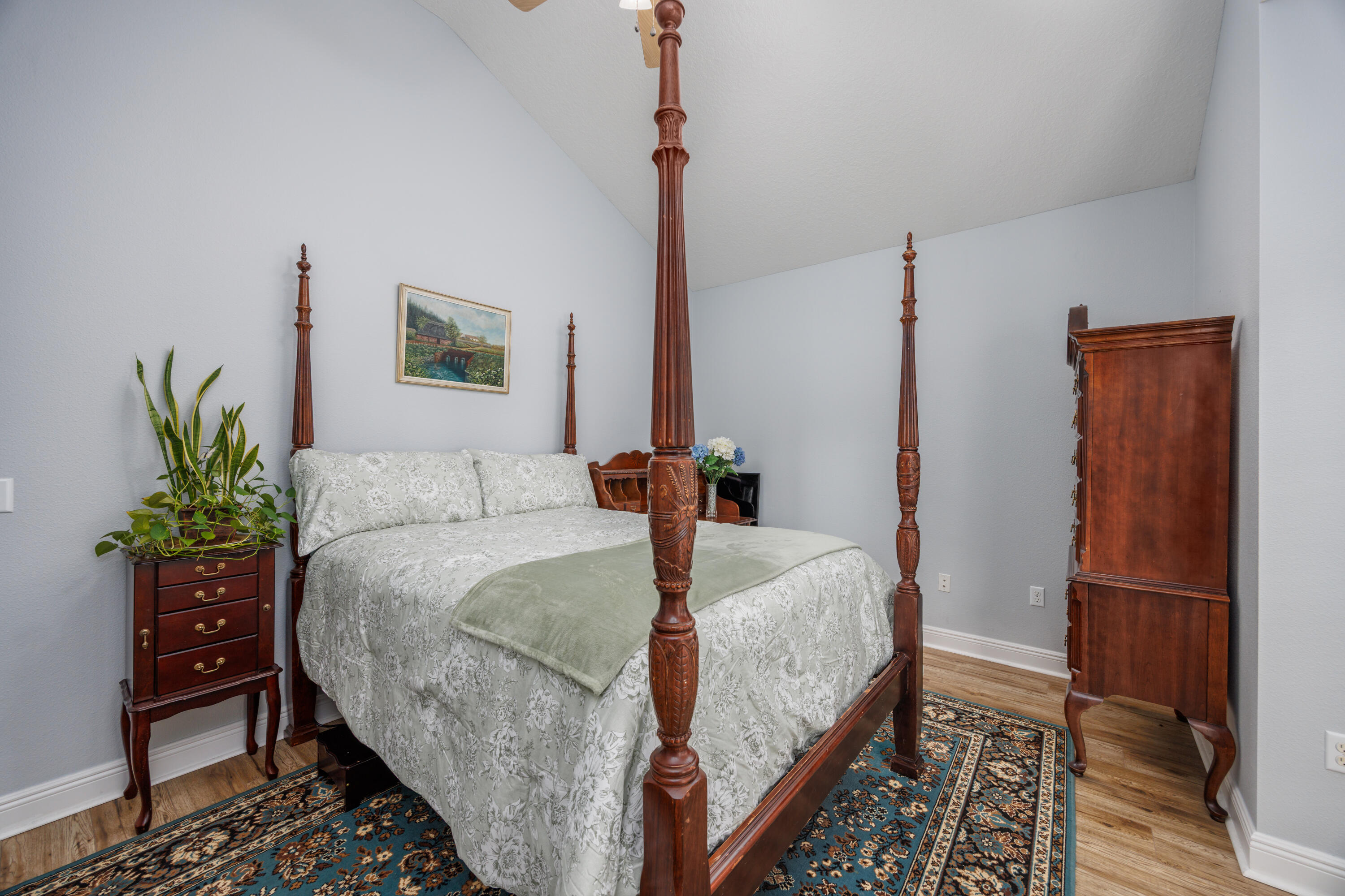 38 Camellia Court Freeport, FL 32439 - Photo 23 of 91 a bedroom with bed and wooden floor