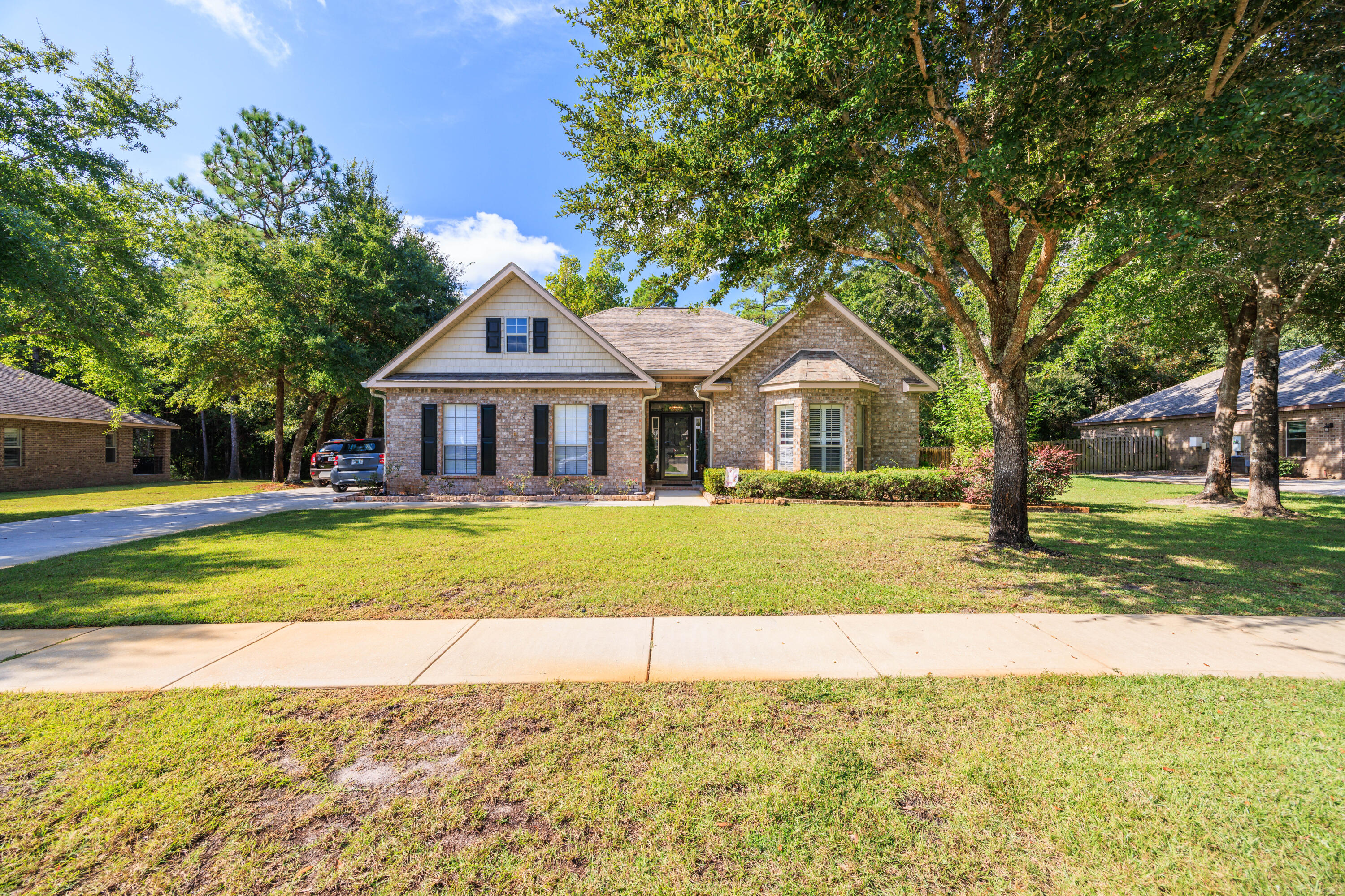 38 Camellia Court Freeport, FL 32439 - Photo 29 of 91 a house with swimming pool in front of it