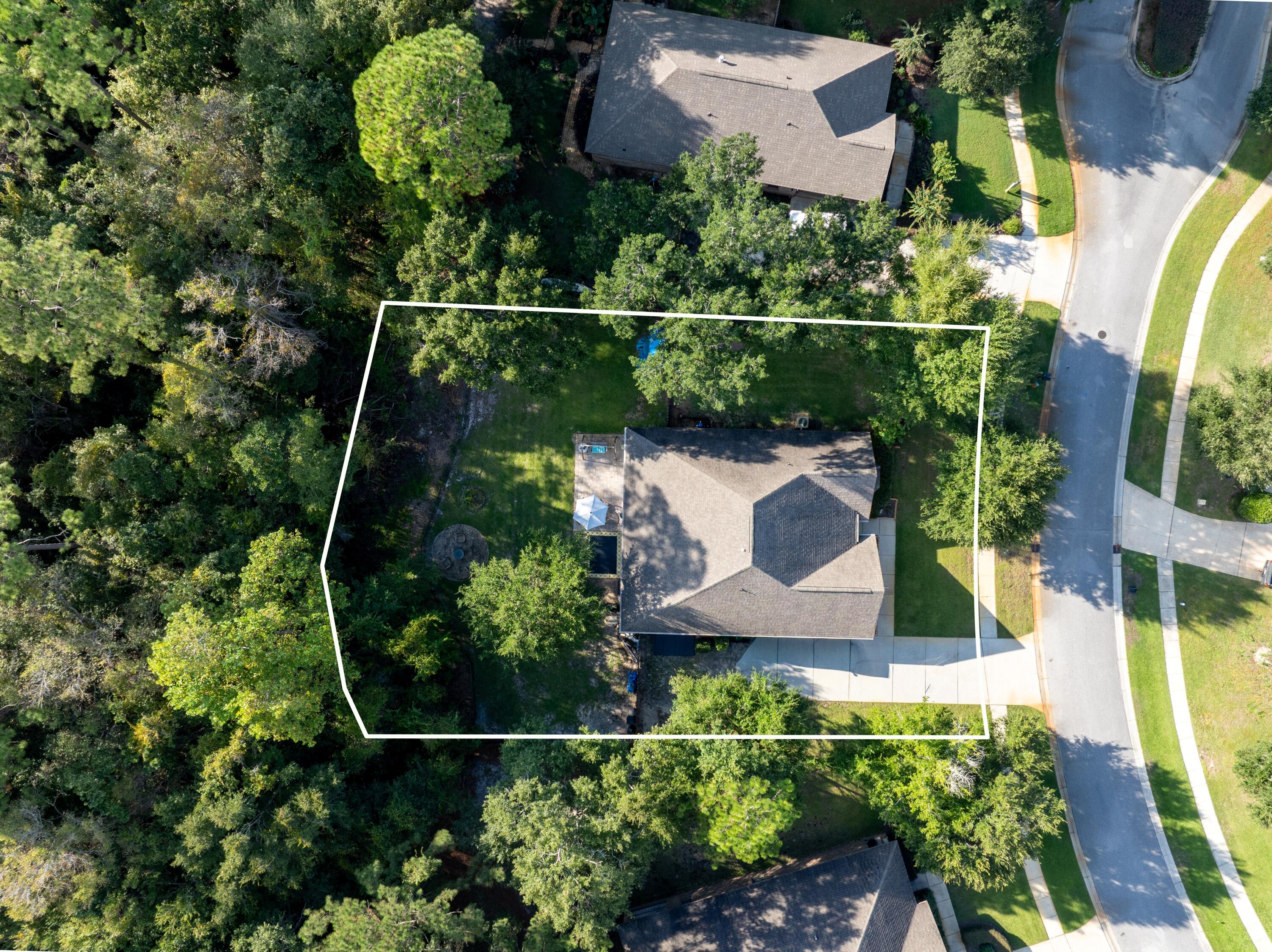 38 Camellia Court Freeport, FL 32439 - Photo 35 of 91 an aerial view of a house with a garden