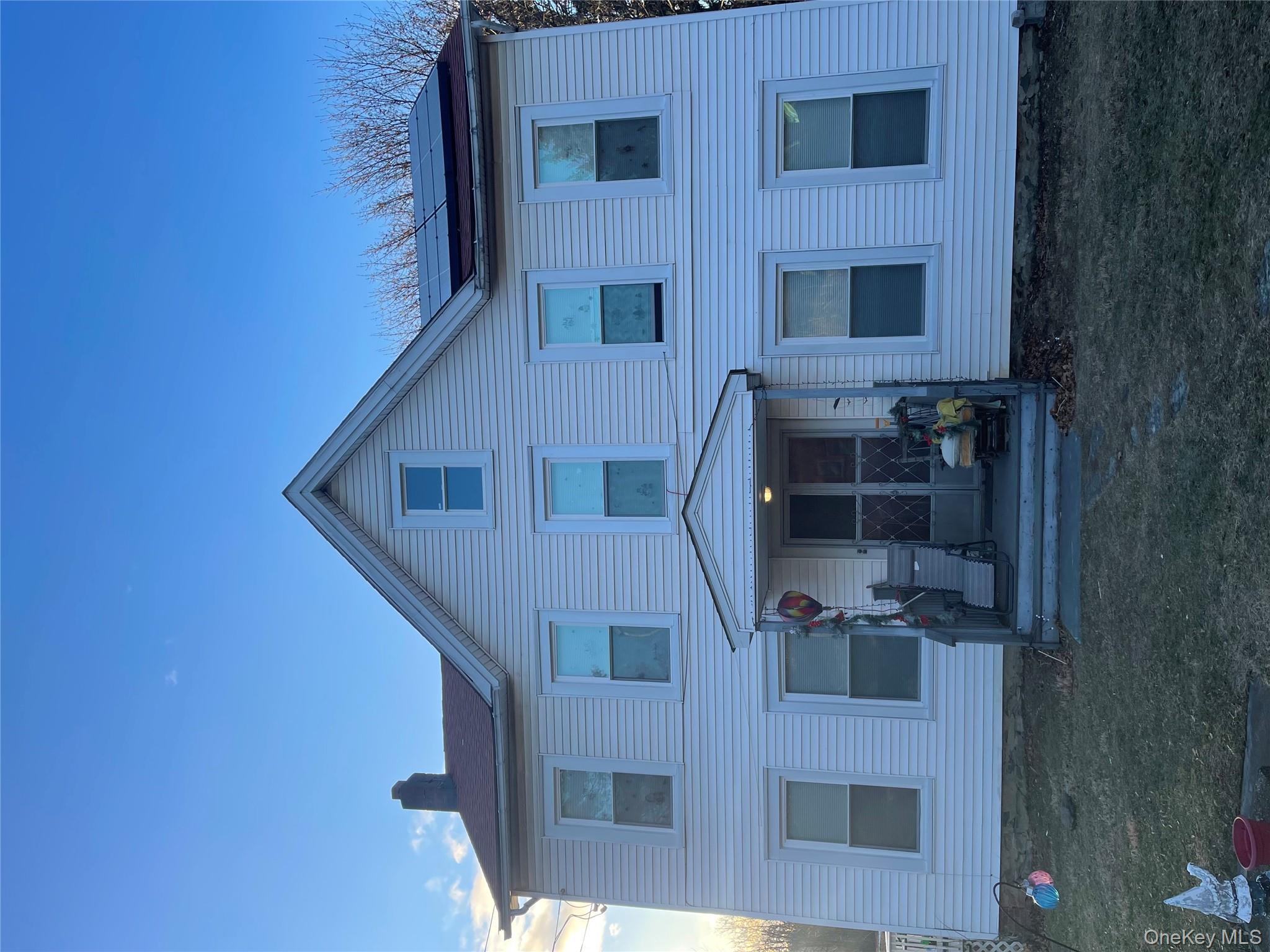 1557 Rte 9W Marlboro, NY 12542 - Photo 1 of 4 a front view of a house with garden