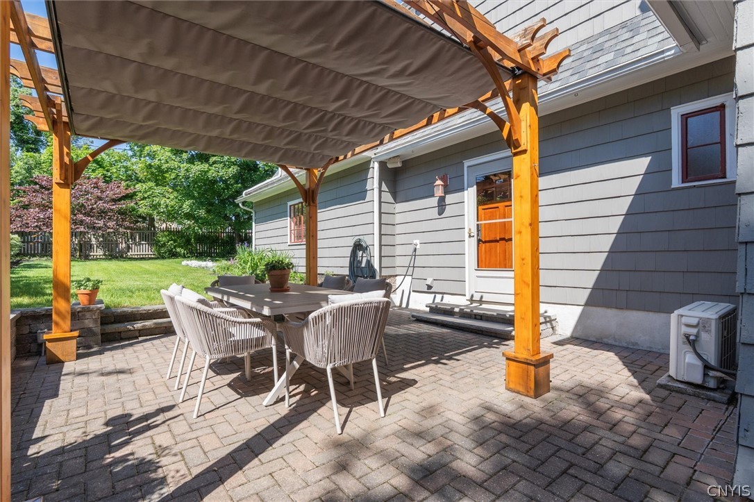 108 Shirley Road Syracuse, NY 13224 - Photo 35 of 50 Paver Patio with shaded pergola-just stained in 20