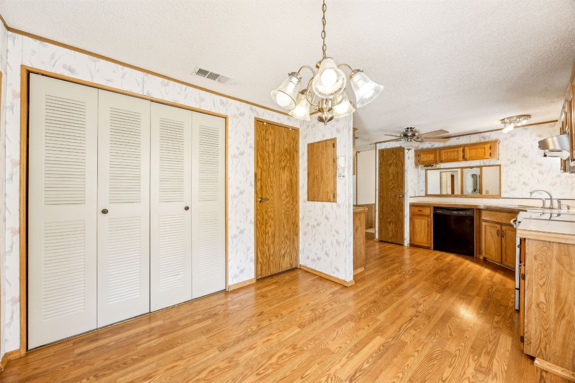 85256 Stephen Road Yulee, FL 32097 - Photo 14 of 40 a view of a kitchen with a sink and dishwasher