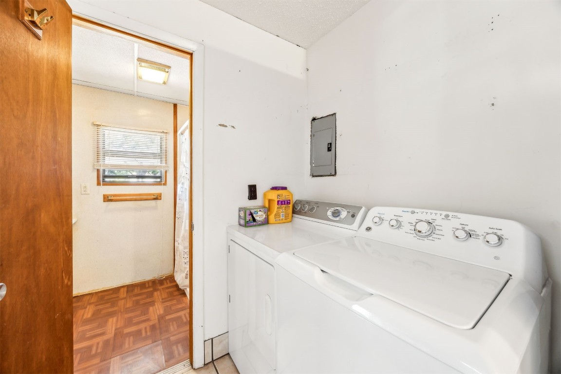 85256 Stephen Road Yulee, FL 32097 - Photo 24 of 40 a utility room with dryer and washer