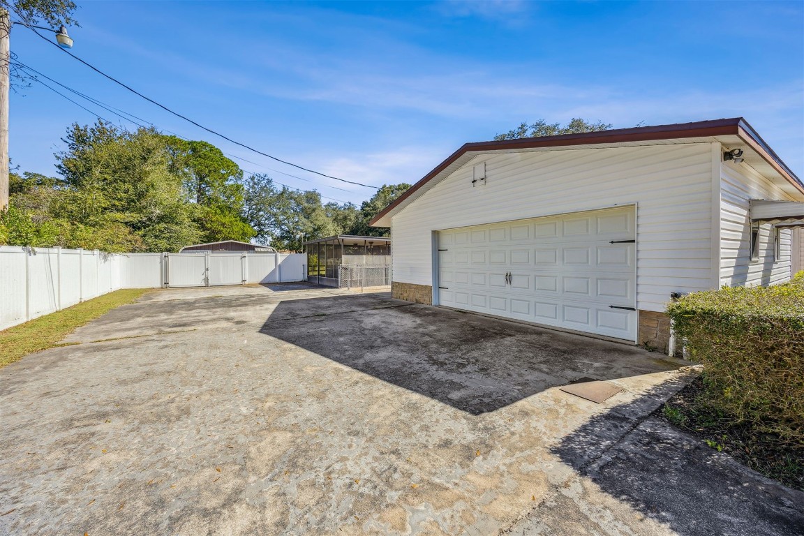 85256 Stephen Road Yulee, FL 32097 - Photo 27 of 40 a view of a backyard of a house