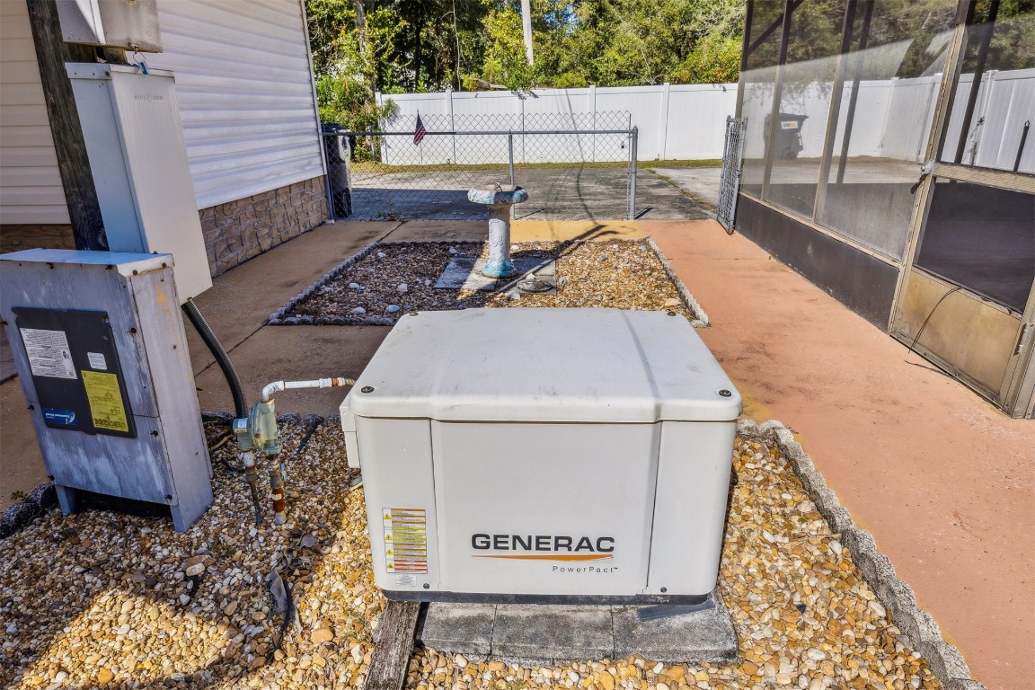 85256 Stephen Road Yulee, FL 32097 - Photo 28 of 40 a view of a backyard with sitting area