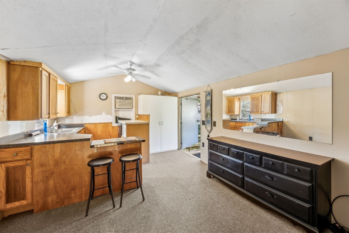 85256 Stephen Road Yulee, FL 32097 - Photo 33 of 40 a room with a table chairs and a view of living room