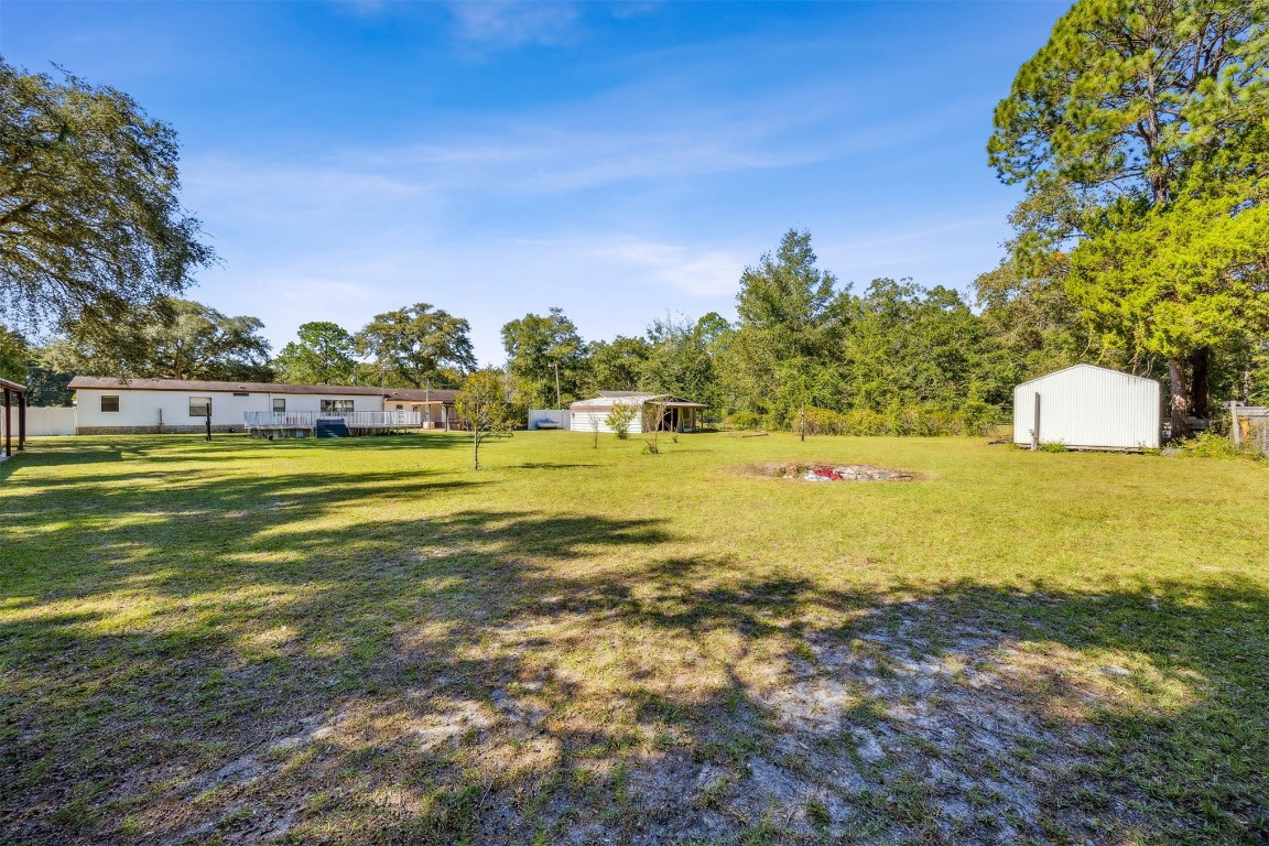 85256 Stephen Road Yulee, FL 32097 - Photo 36 of 40 a view of a large trees with swimming pool