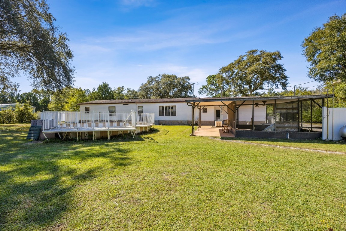 85256 Stephen Road Yulee, FL 32097 - Photo 38 of 40 a view of a swimming pool with a patio