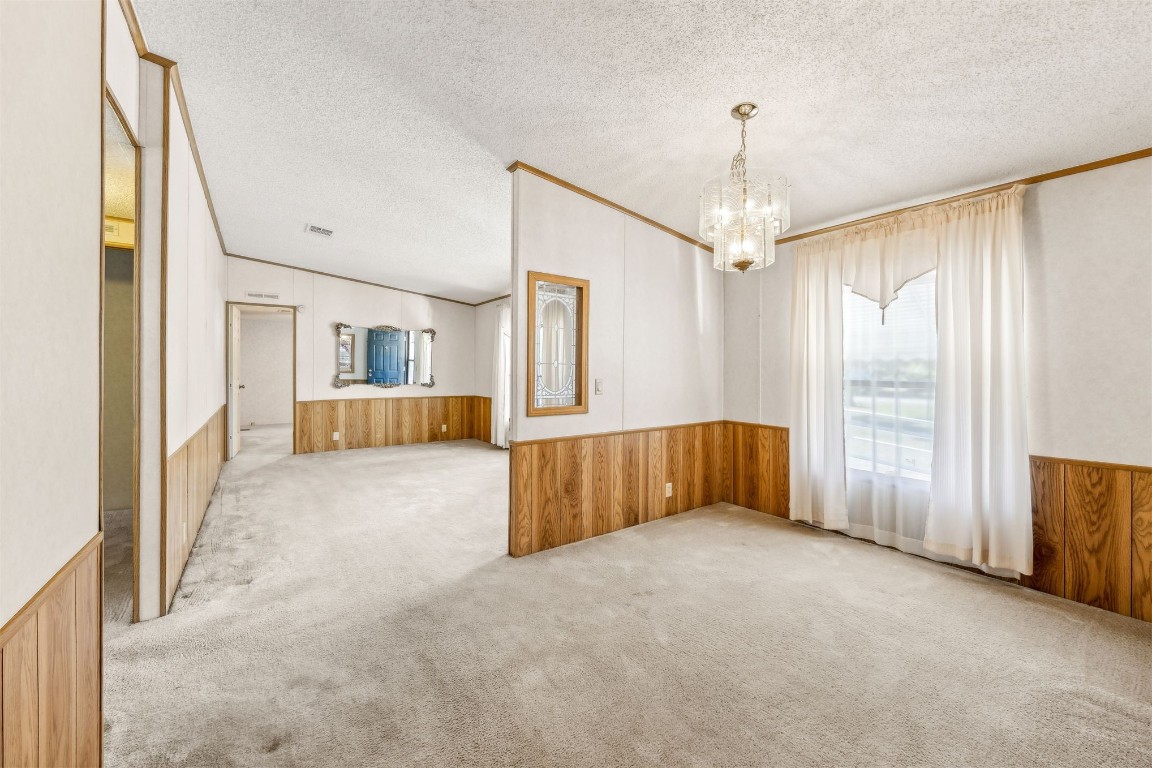 85256 Stephen Road Yulee, FL 32097 - Photo 6 of 40 a view of an empty room with a window