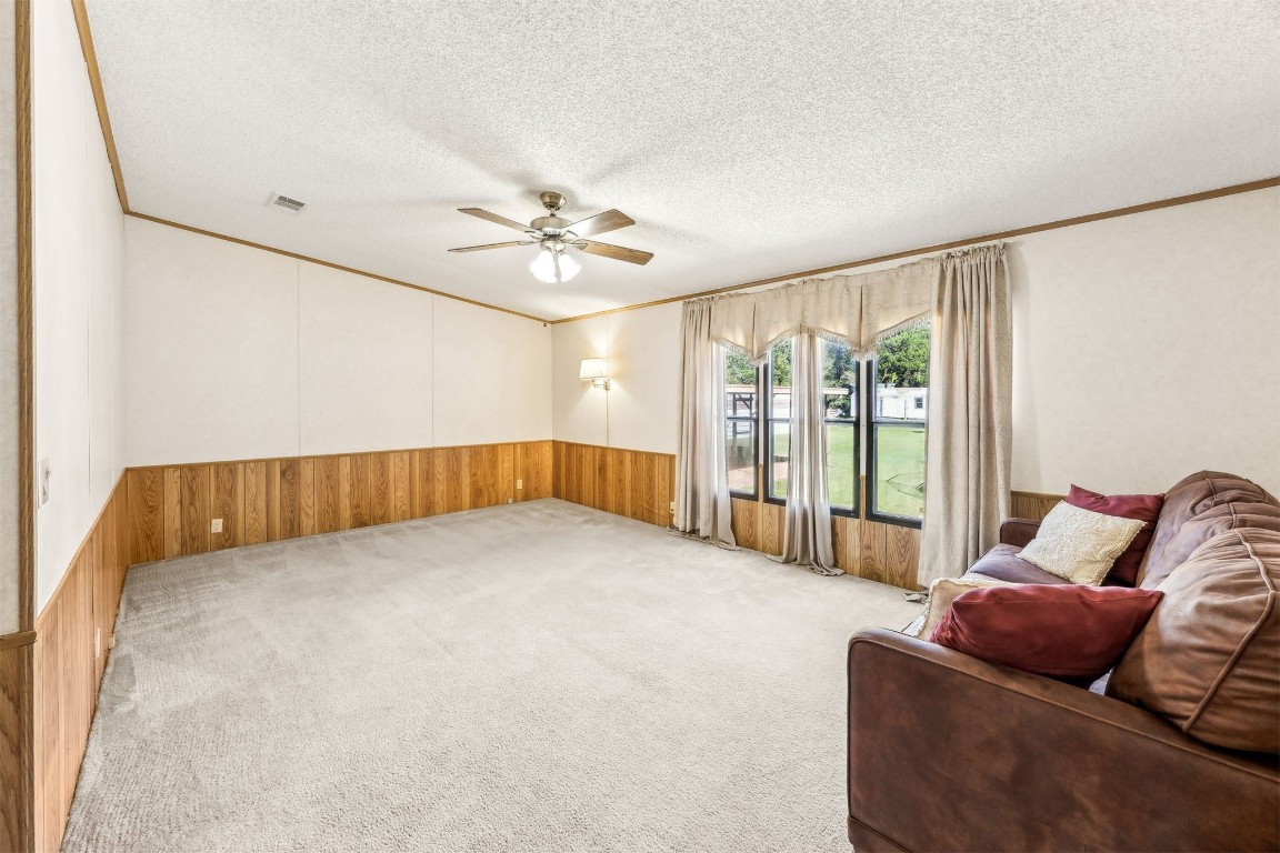85256 Stephen Road Yulee, FL 32097 - Photo 9 of 40 a living room with furniture and wooden floor