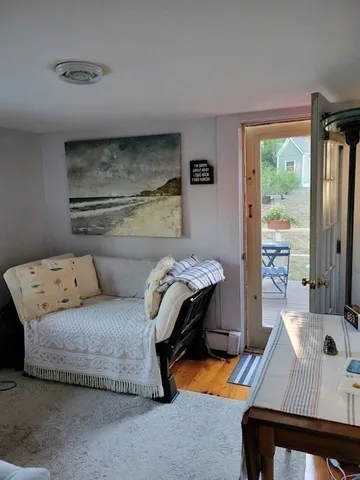 a view of a chairs and table in the patio