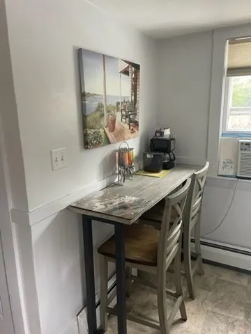 a utility room with sink dryer and washer