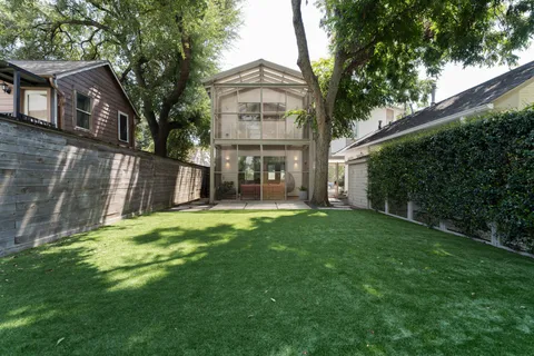 a view of a livingroom with furniture window and wooden floor